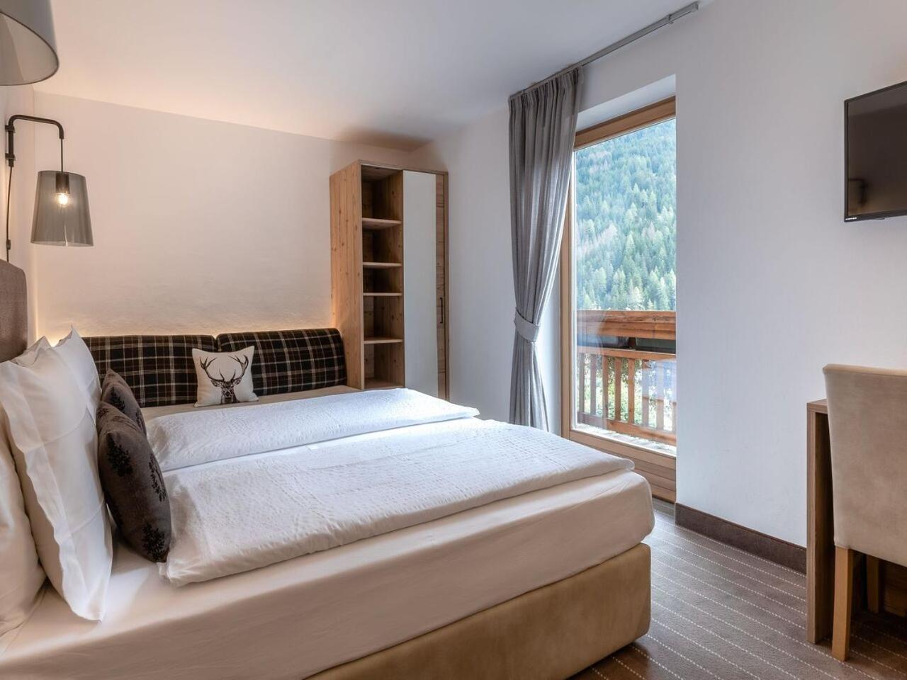 Hotel Madonnina Resort And Wellness Soraga Exterior photo