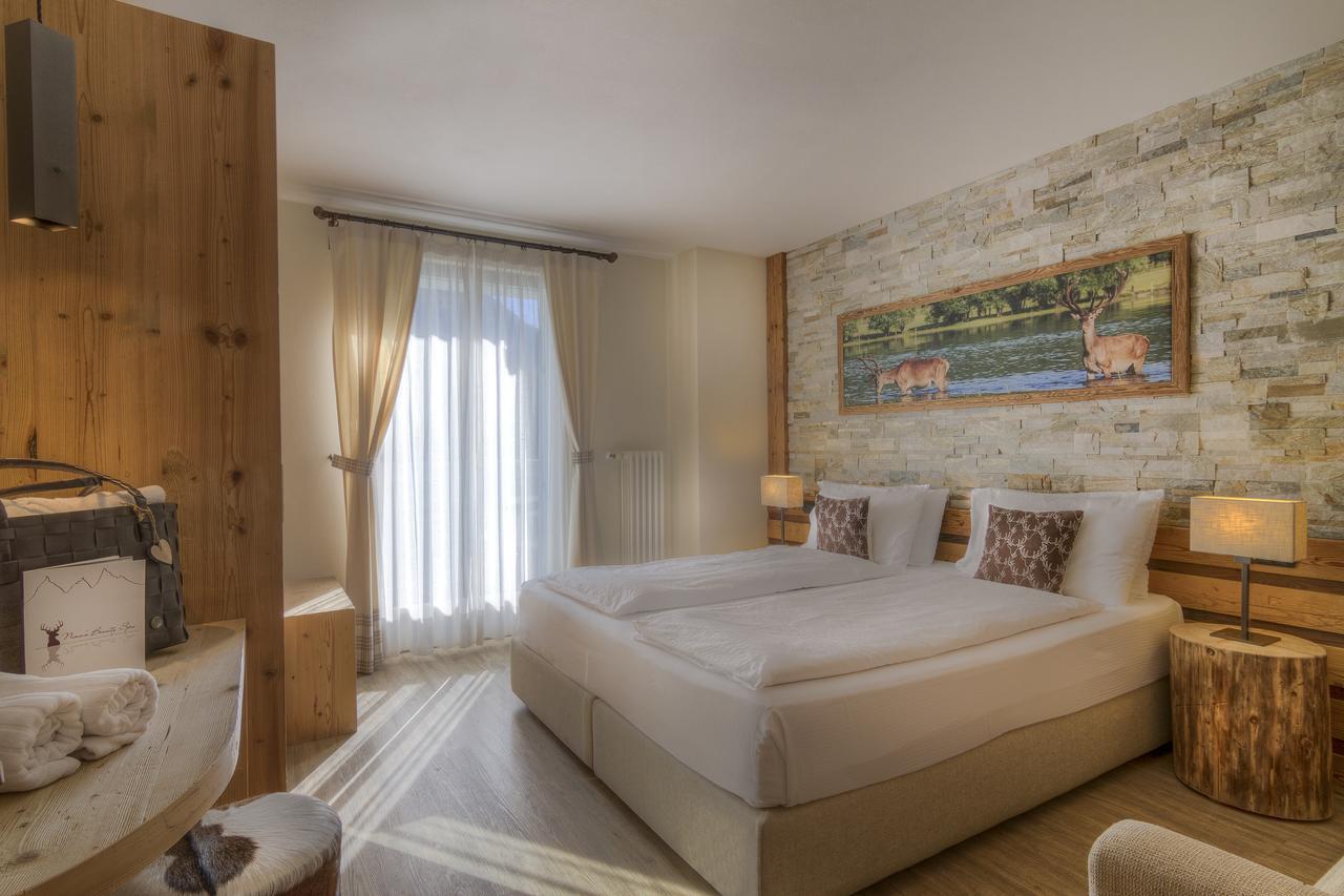 Hotel Madonnina Resort And Wellness Soraga Exterior photo